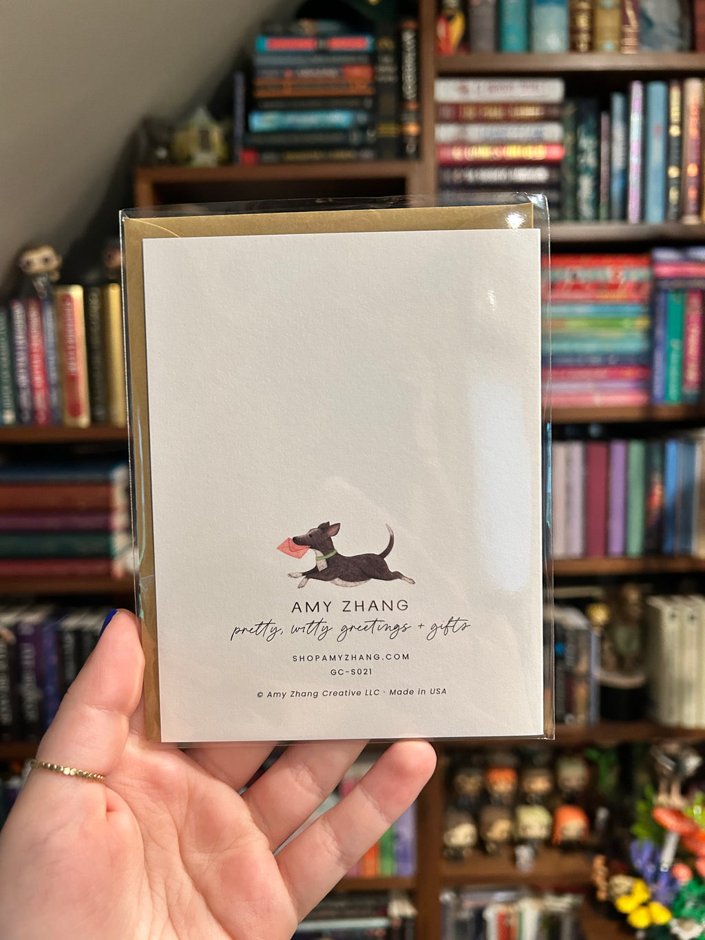 Back of minimalist pet sympathy greeting card featuring printer information: Amy Zhang. Made in the USA