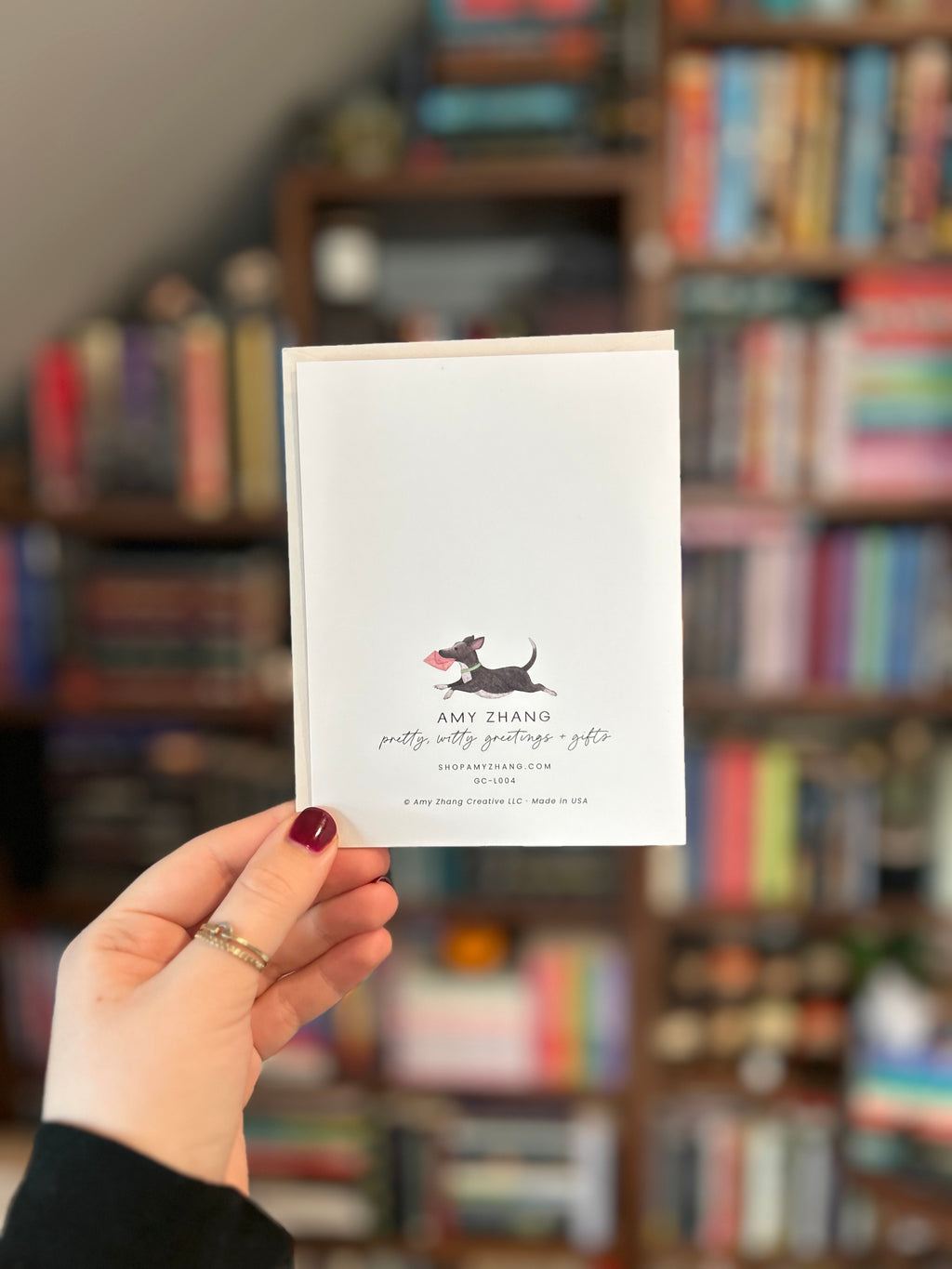 Back of minimalist greeting card featuring printer information: Amy Zhang. Printed in USA