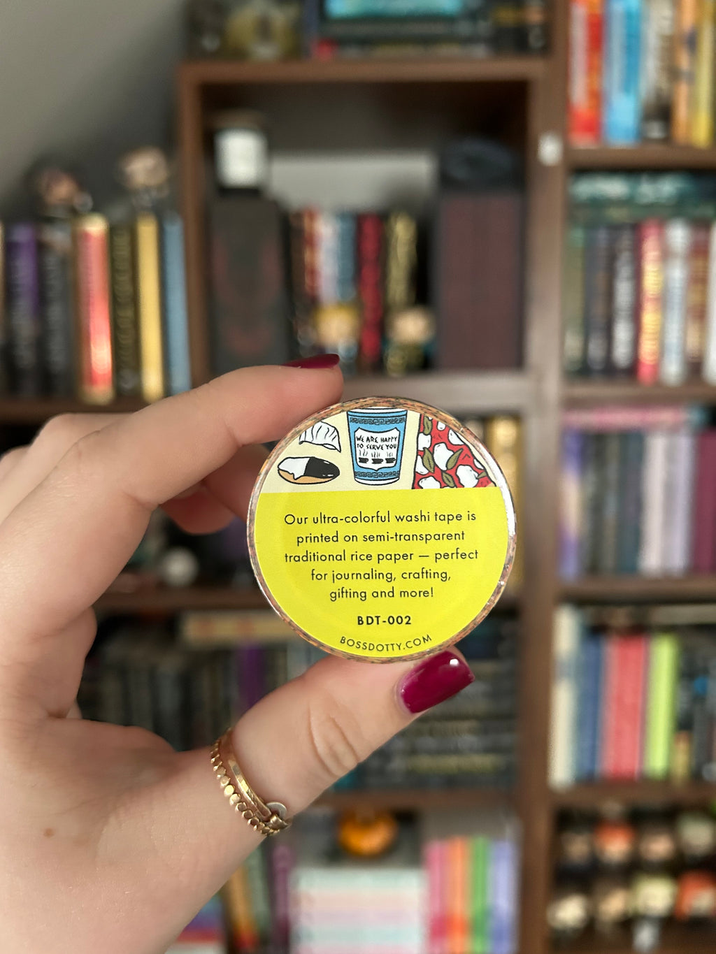 Decorative washi tape featuring illustrations of iconic New York foods including pizza, bagels, hot dogs, coffee, pretzels, and deli favorites.
Boss Dotty