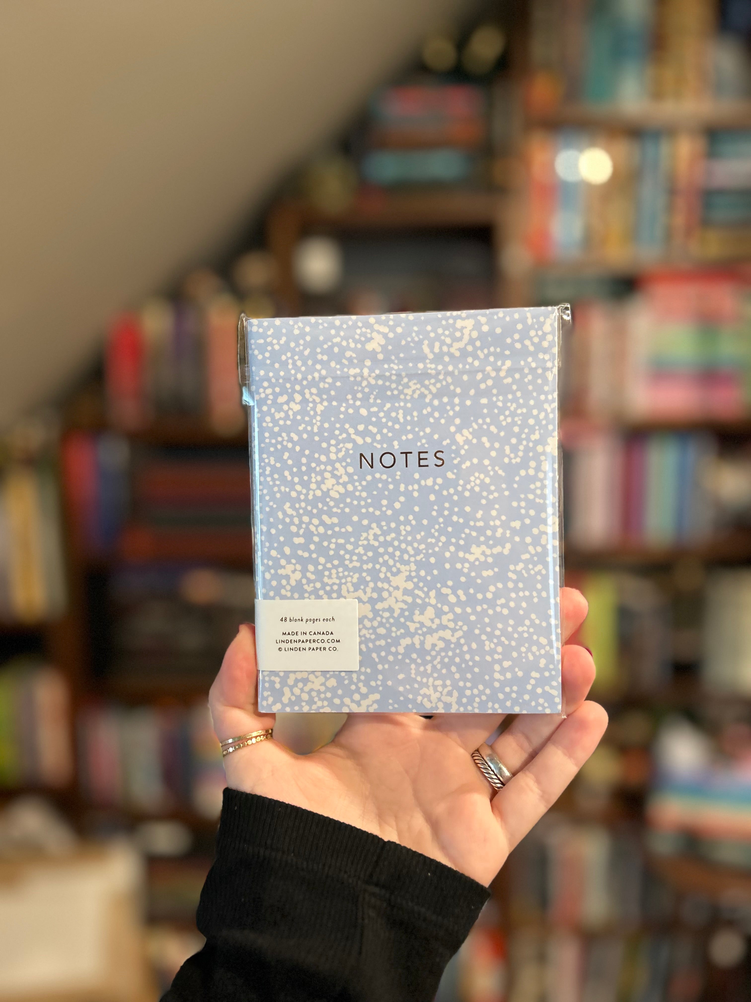 Blue dotted notebook featuring coordinating floral cover designs with gold foil details, 44 blank pages, and saddle stitched binding.