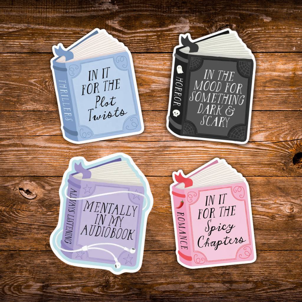 Four book-shaped stickers arranged on a rustic wooden background. The stickers feature different pastel and dark tones with book spines and decorative illustrations, each with a quote like 'In It for the Plot Twists' and 'Mentally in My Audiobook'.
