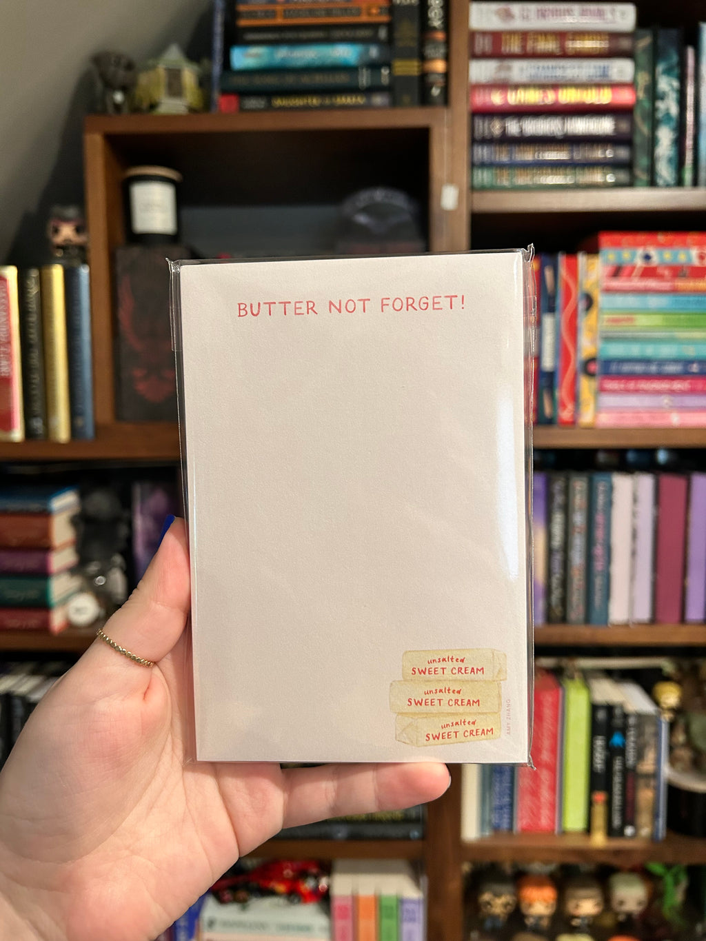 Butter-themed tear-away notepad featuring stacked butter sticks and the phrase "Butter Not Forget!"