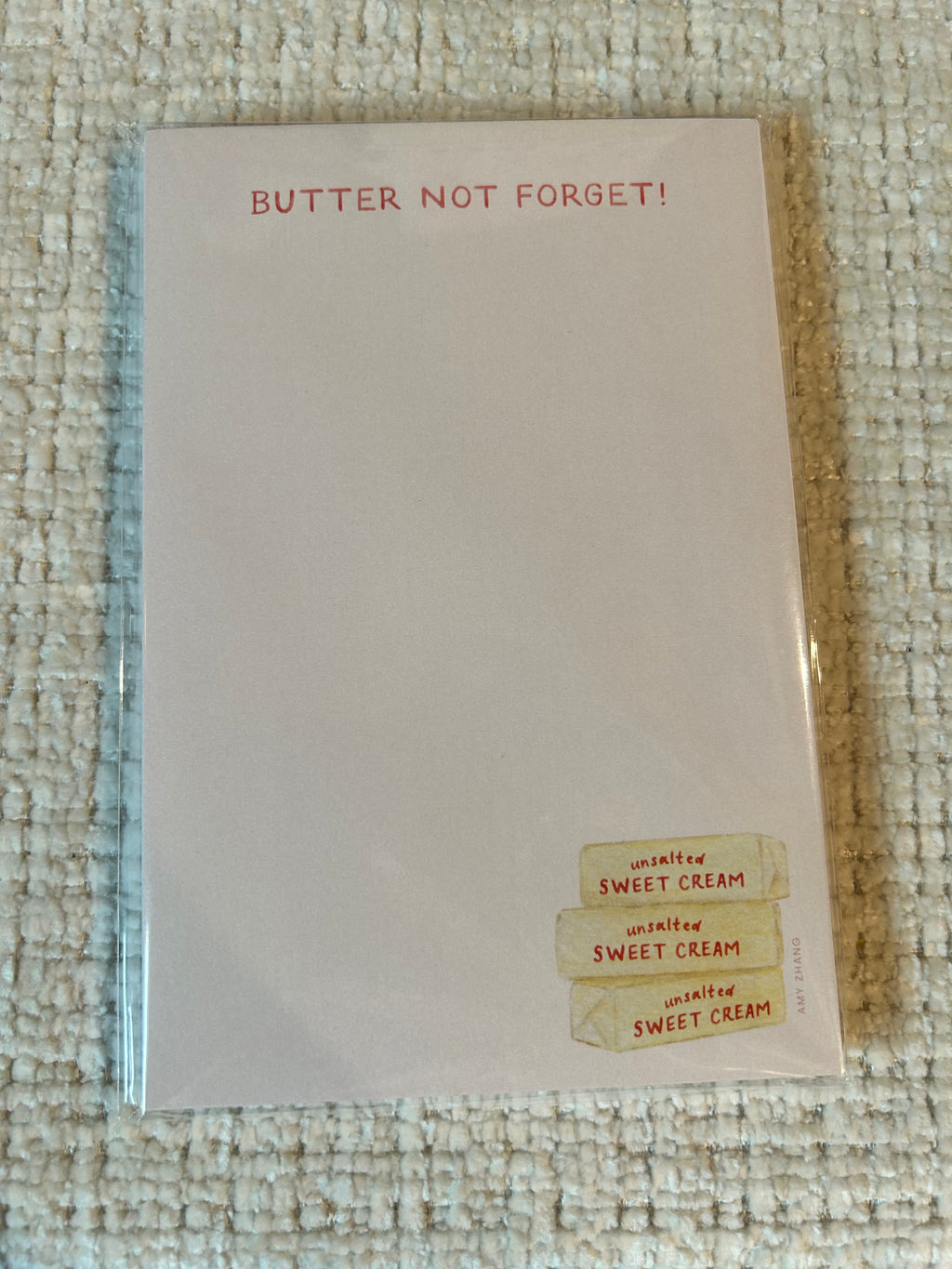 Butter-themed tear-away notepad featuring stacked butter sticks and the phrase "Butter Not Forget!"