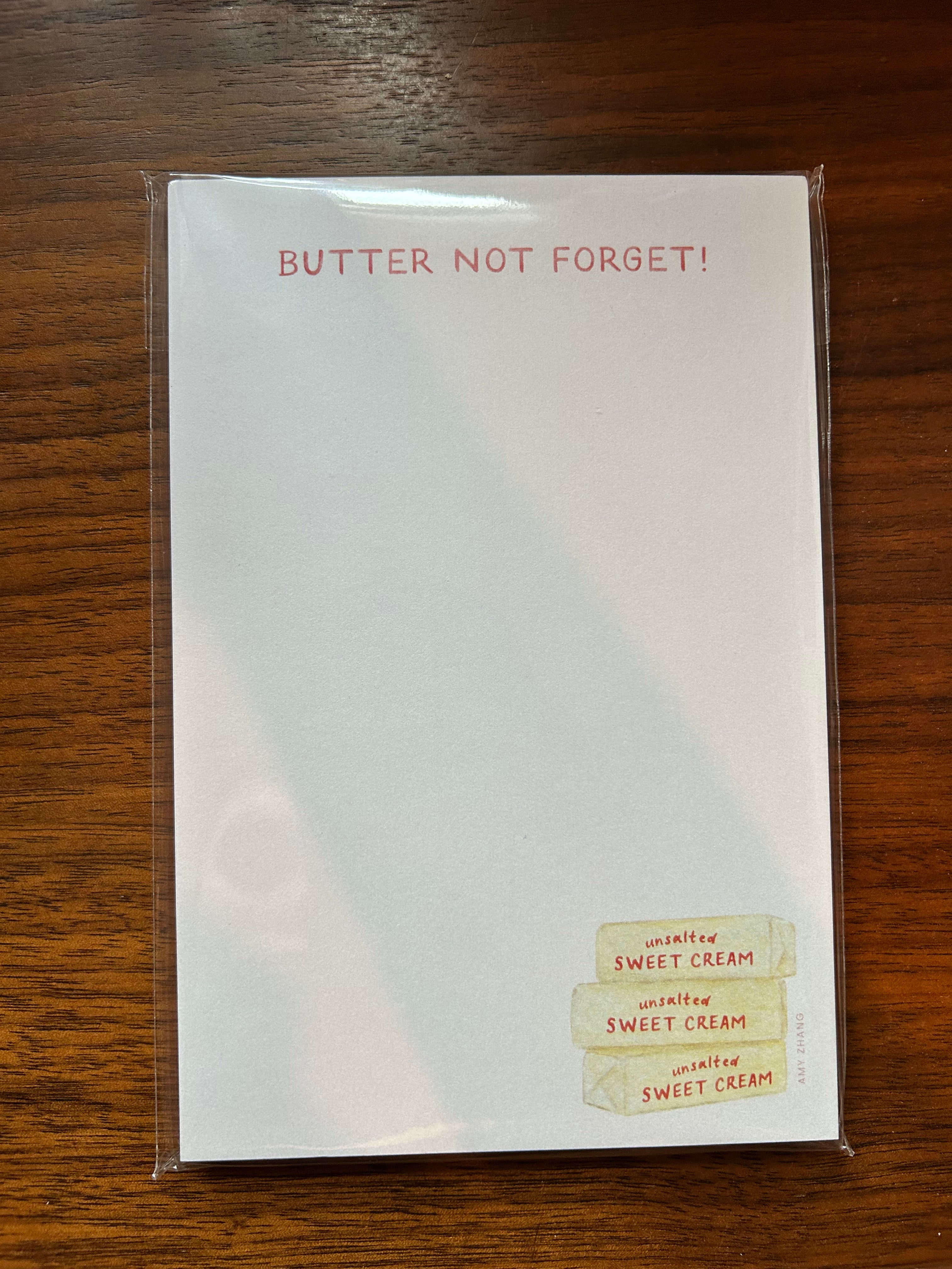 Butter-themed tear-away notepad featuring stacked butter sticks and the phrase "Butter Not Forget!"