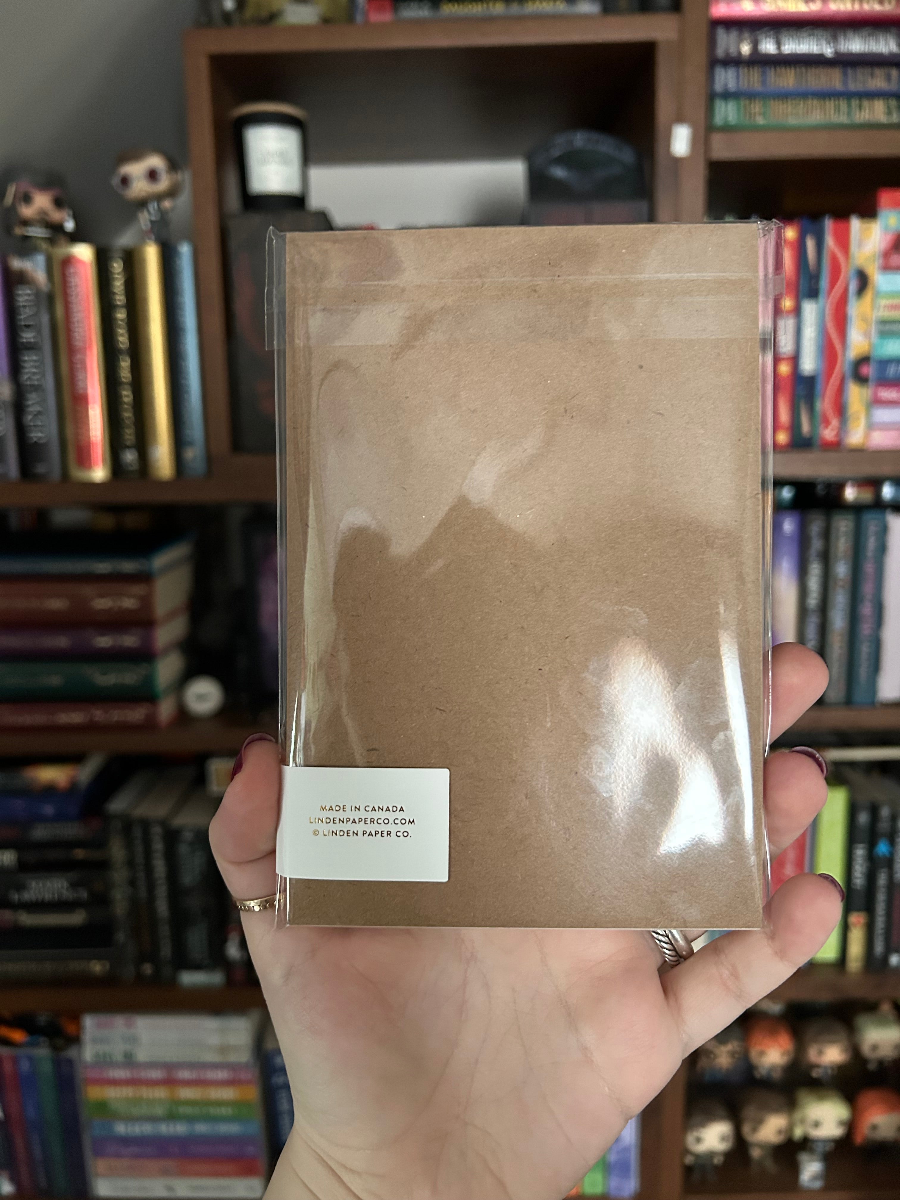 Back of tear-away notepad featuring printer information: Linden Paper Co. Made in Canada