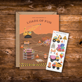 Interactive construction birthday greeting card featuring a construction site made of birthday treats, including a crane, dump trucks, cake, sprinkles, and a matching construction-themed sticker sheet.
