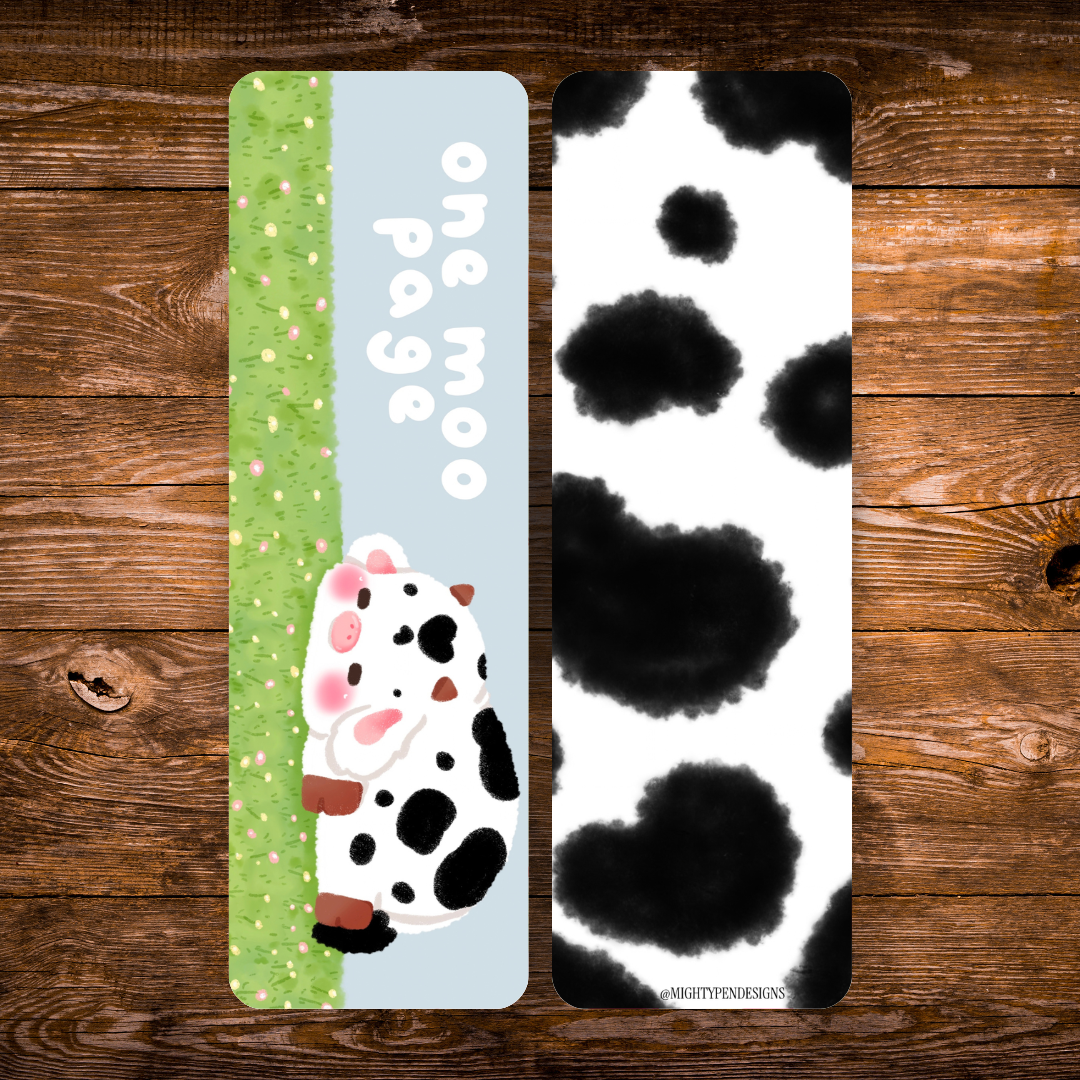 Double-sided cow bookmark featuring a rosy-cheeked white cow in a green grassy field with playful lettering, paired with a black-and-white cow print reverse.