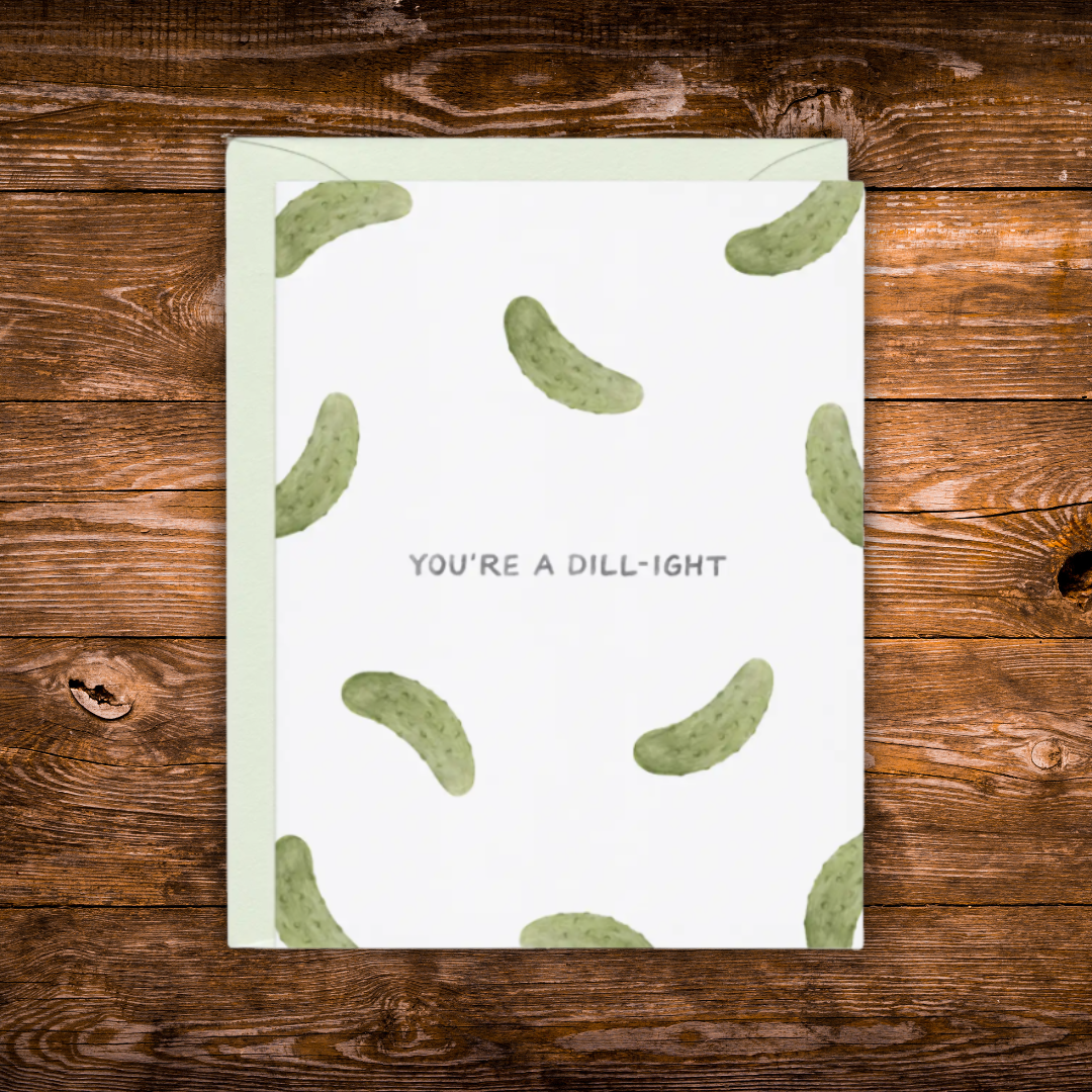 Greeting card featuring a watercolor pickle pattern with the phrase "You're a Dill-ight."