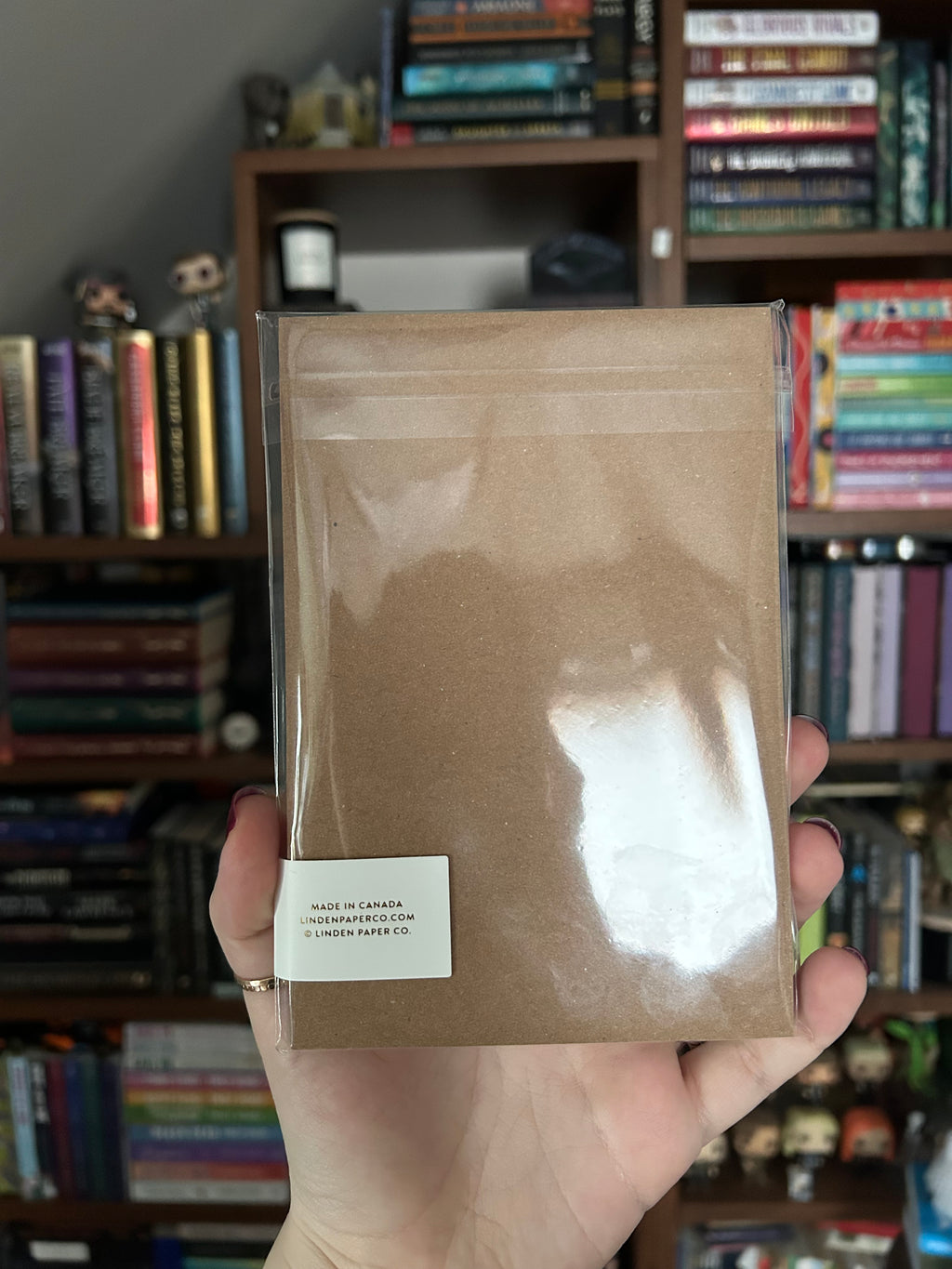 Back of tear-away notepad featuring printer information: Linden Paper Co. Made in Canada