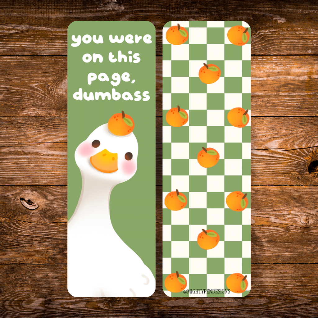 Double-sided bookmark featuring a white duck holding an orange and the phrase “You were on this page, dumbass,” with a green checkerboard and orange pattern on the reverse.