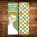 Double-sided bookmark featuring a white duck holding an orange and the phrase “You were on this page, dumbass,” with a green checkerboard and orange pattern on the reverse.
