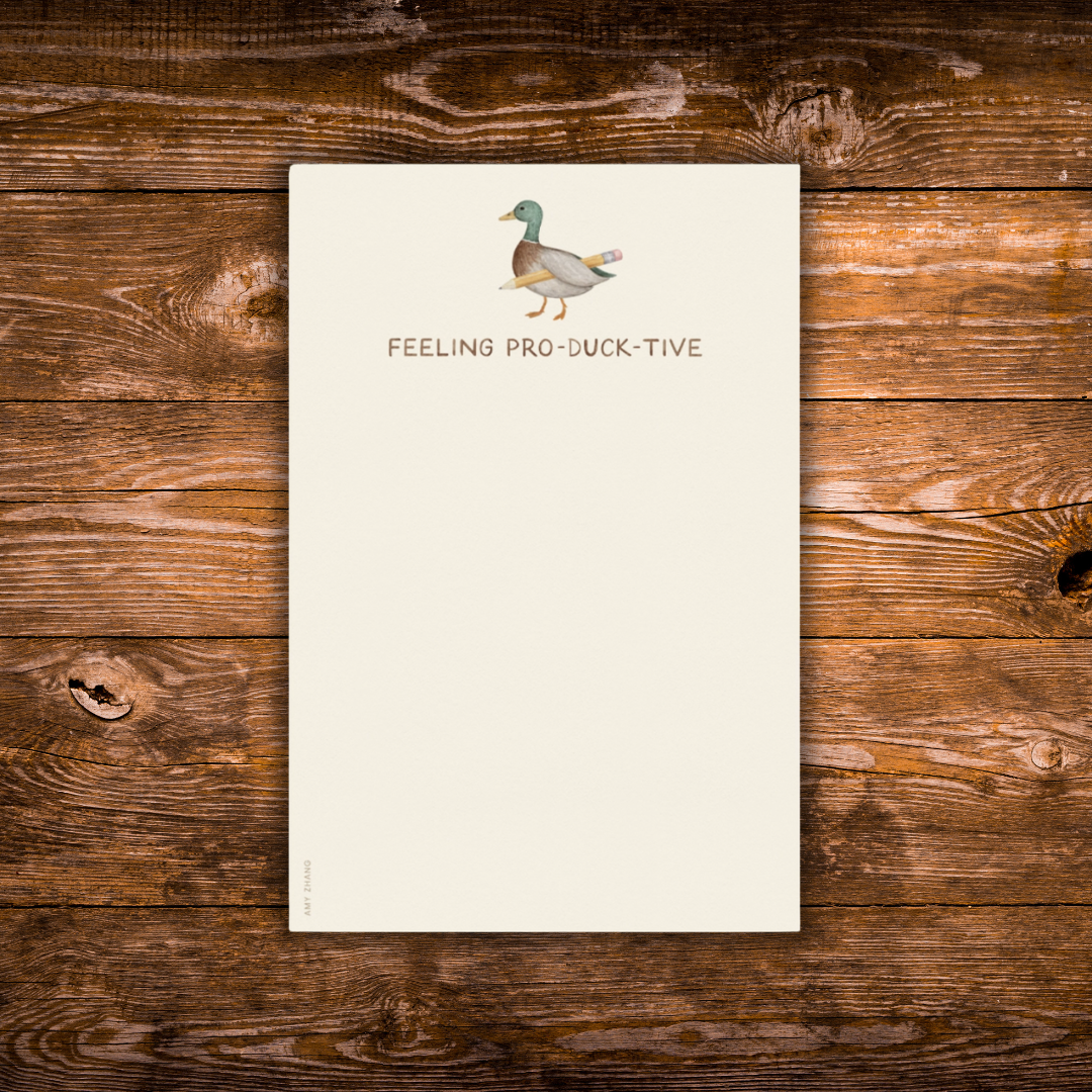 Duck-themed tear-away notepad featuring an illustrated duck holding a pencil and the phrase "Feeling Pro-Duck-Tive."