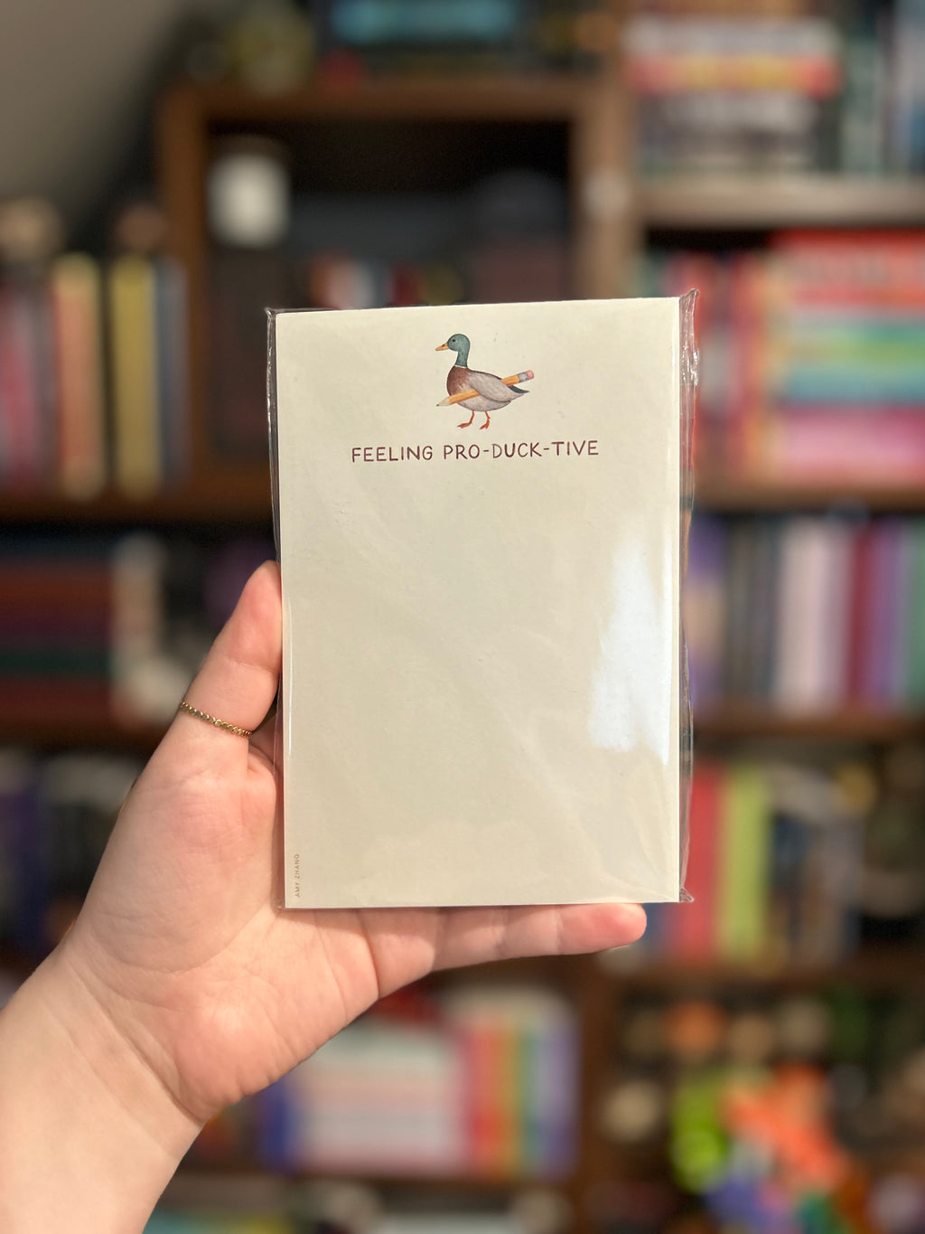 Duck-themed tear-away notepad featuring an illustrated duck holding a pencil and the phrase "Feeling Pro-Duck-Tive."