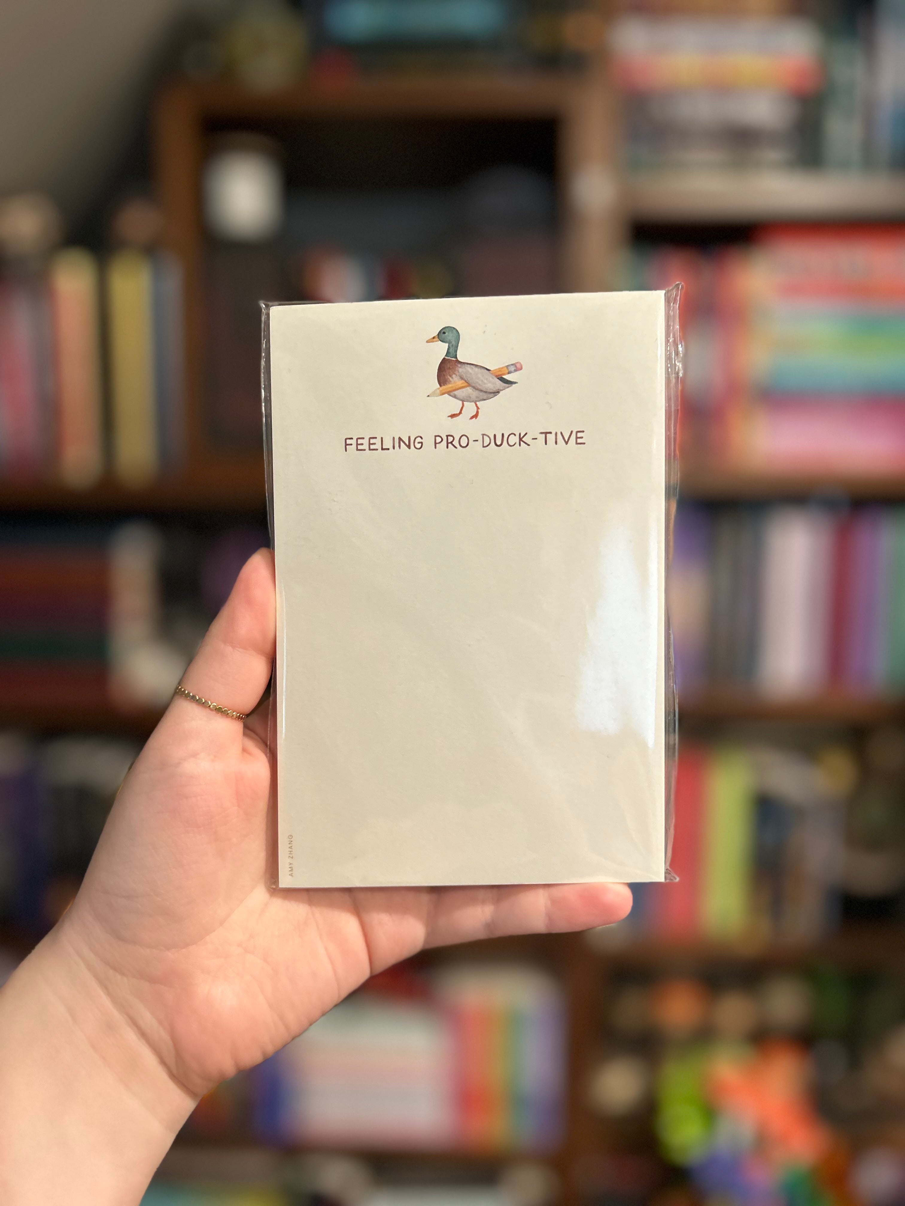 Duck-themed tear-away notepad featuring an illustrated duck holding a pencil and the phrase "Feeling Pro-Duck-Tive."