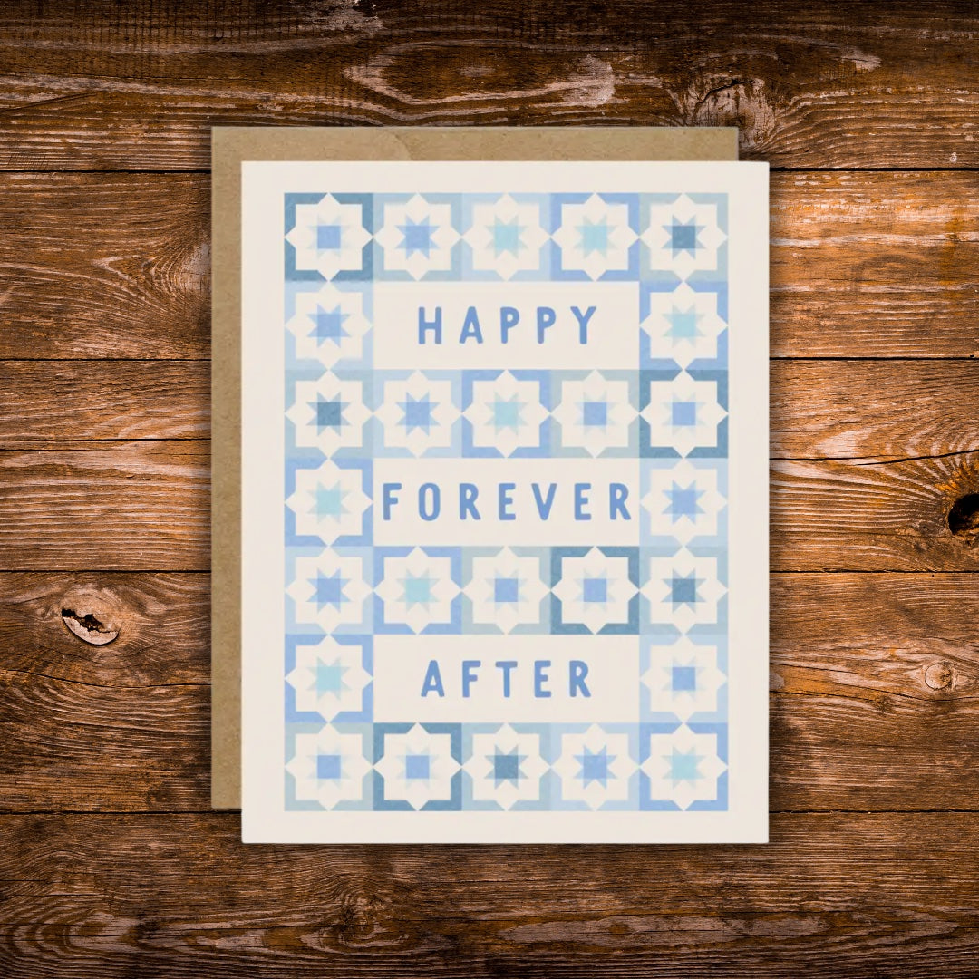 Modern wedding greeting card featuring the words "Happy Forever After" surrounded by a blue geometric tile pattern on a white background.