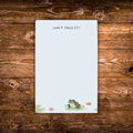 Frog-themed tear-away notepad featuring a frog on a lily pad with the phrase "Don't Frog-Et!"