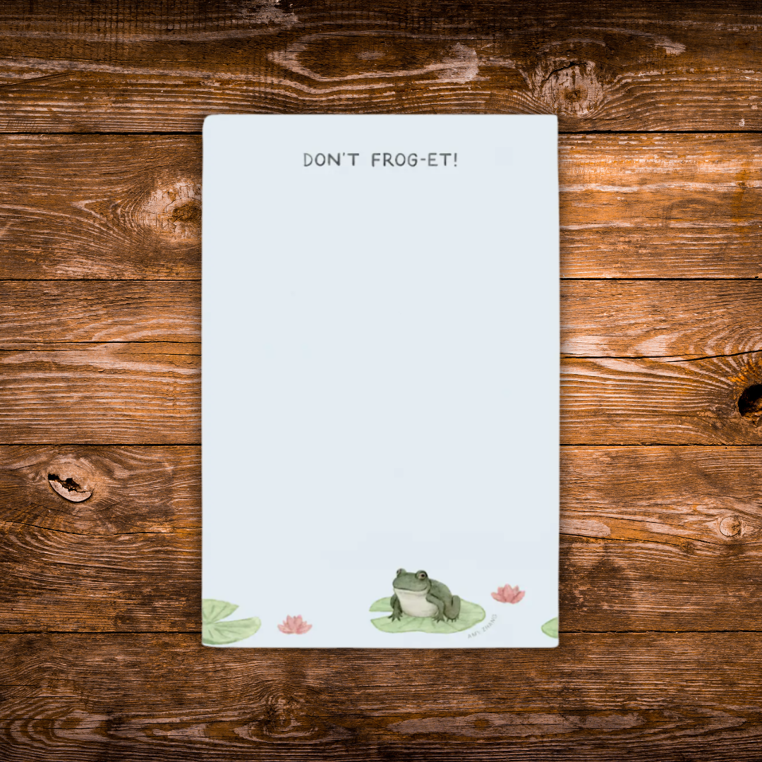 Frog-themed tear-away notepad featuring a frog on a lily pad with the phrase "Don't Frog-Et!"