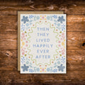 Pastel floral wedding greeting card featuring the phrase "Then They Lived Happily Ever After" surrounded by a colorful floral border.