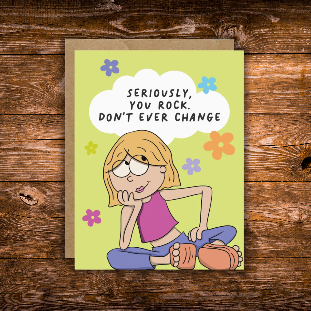 Funny friendship greeting card featuring an illustrated girl sitting with colorful flowers and the message "Seriously, You Rock. Don't Ever Change."