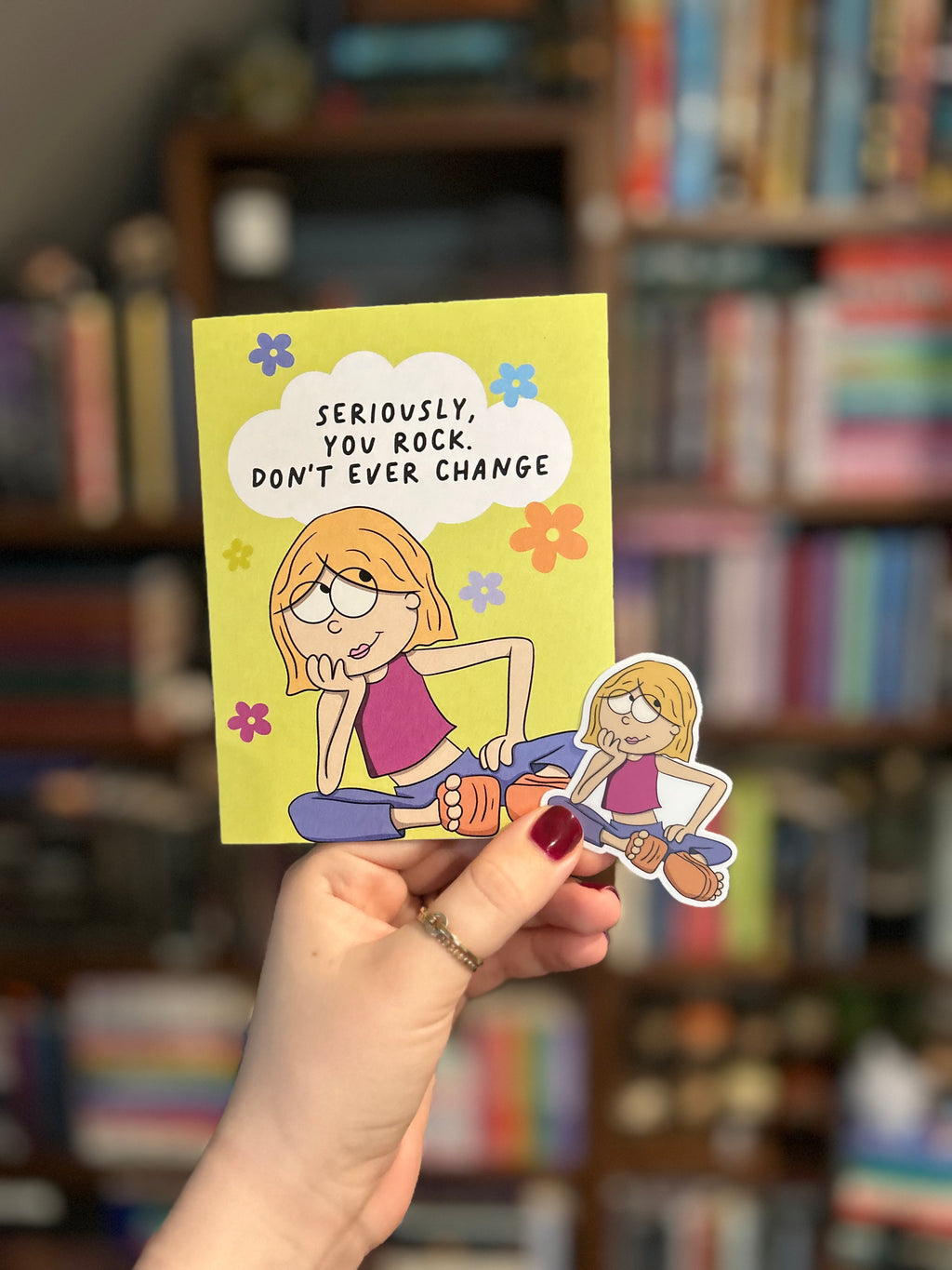 Matching friendship greeting card and waterproof vinyl sticker featuring a retro-inspired illustrated girl with the message "Seriously, You Rock. Don't Ever Change."