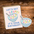 Birthday bundle featuring a colorful cereal-themed greeting card paired with a matching waterproof cereal bowl vinyl sticker