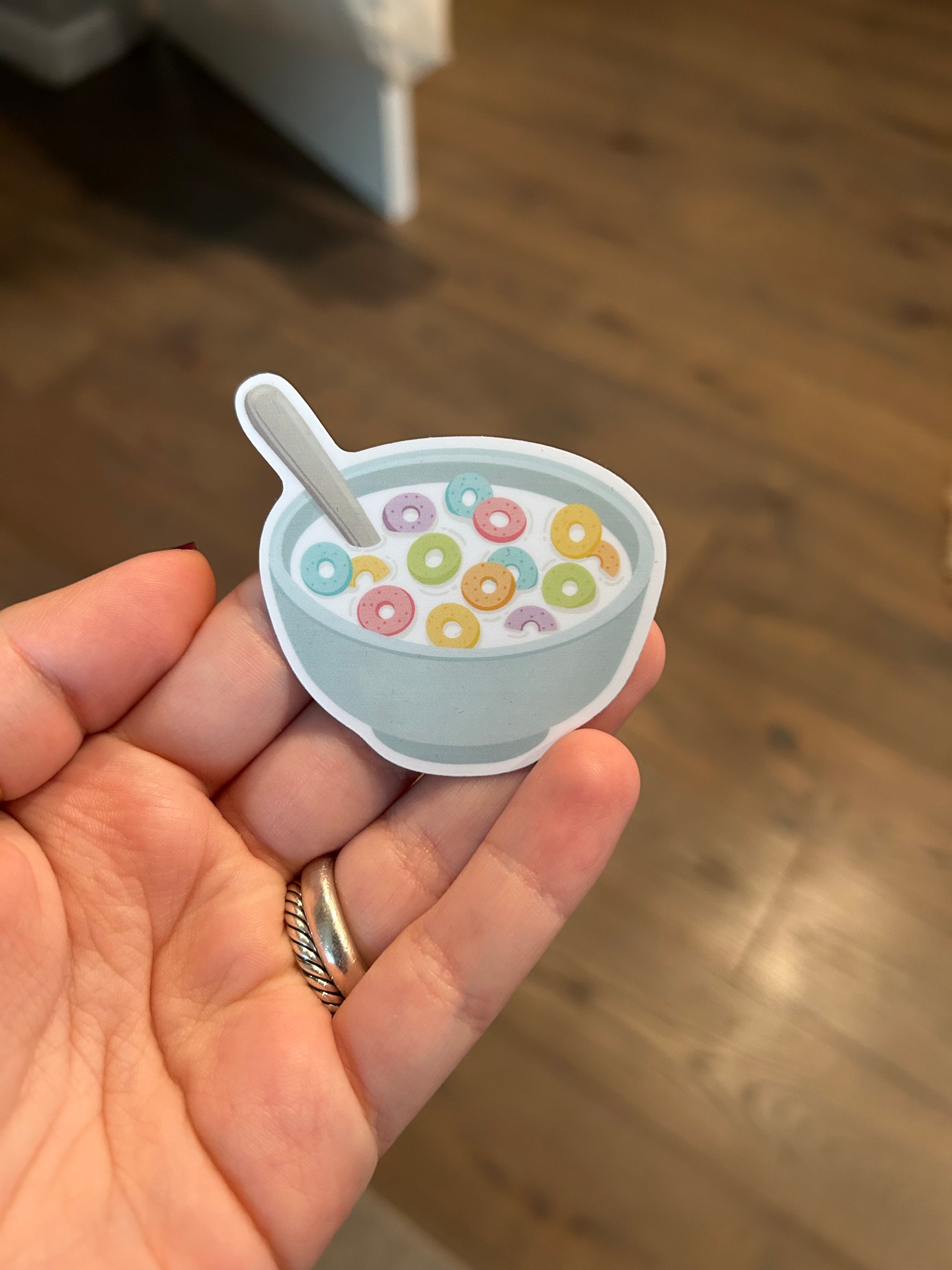 Waterproof vinyl sticker featuring a colorful bowl of cereal with rainbow cereal loops