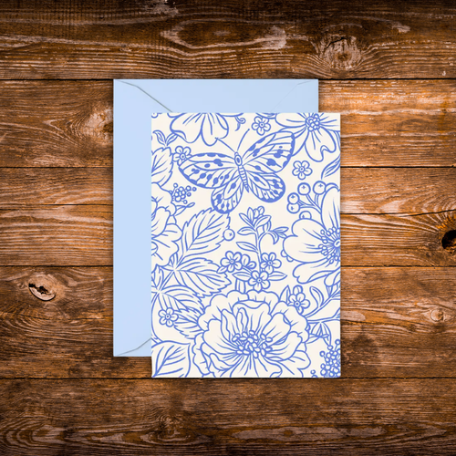 Mini greeting card featuring an elegant blue botanical illustration with flowers and a butterfly on a white background.