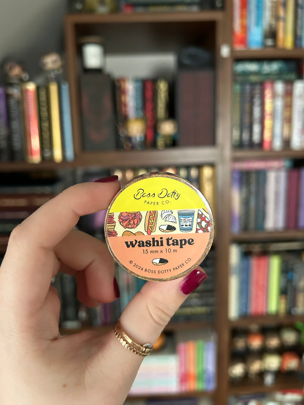 Decorative washi tape featuring illustrations of iconic New York foods including pizza, bagels, hot dogs, coffee, pretzels, and deli favorites.