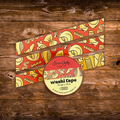 Decorative washi tape featuring illustrated pasta shapes including ravioli, rigatoni, fusilli, shells, and farfalle on a red background.