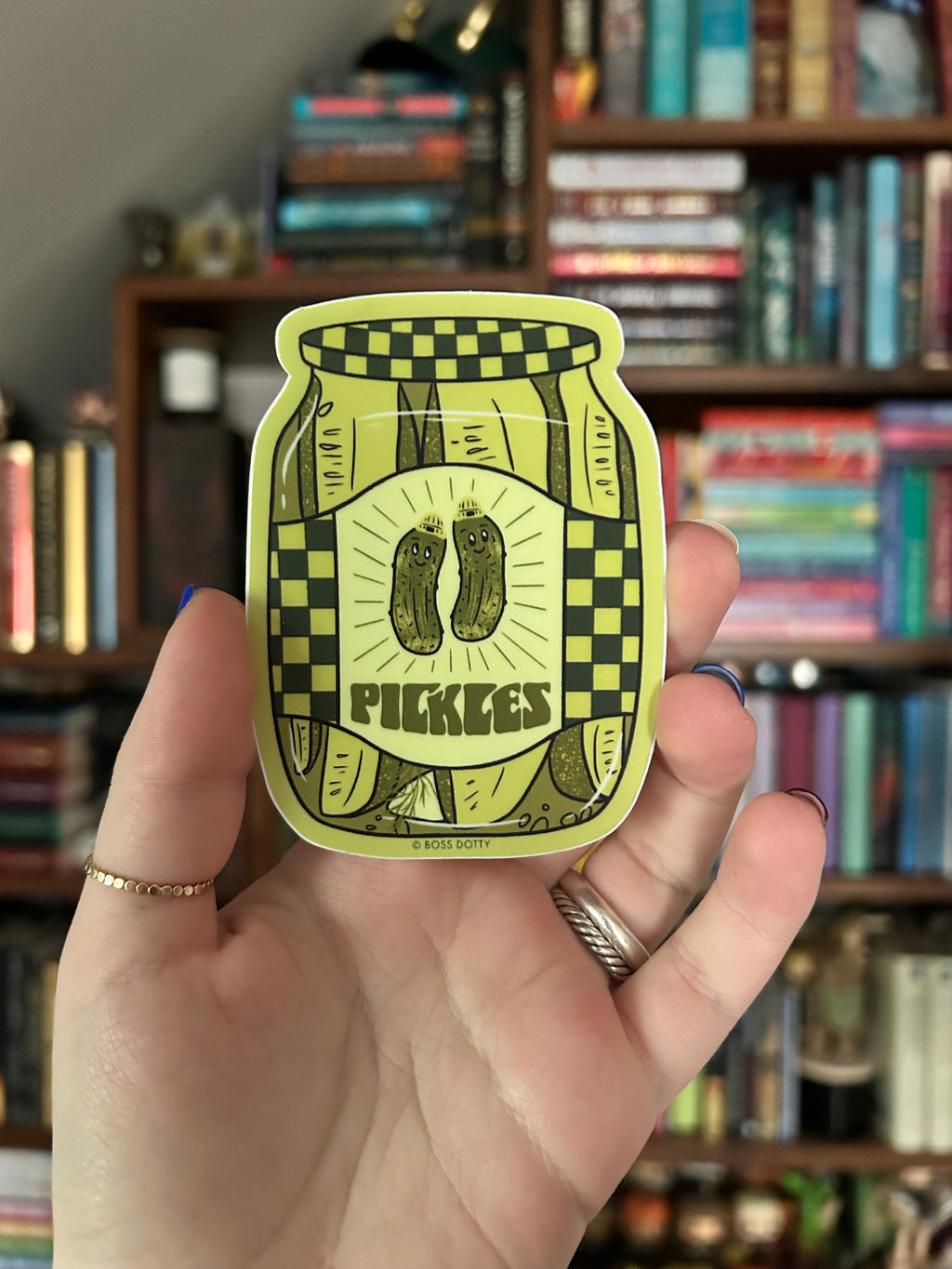 Waterproof vinyl sticker featuring a retro-style jar filled with smiling pickles.
