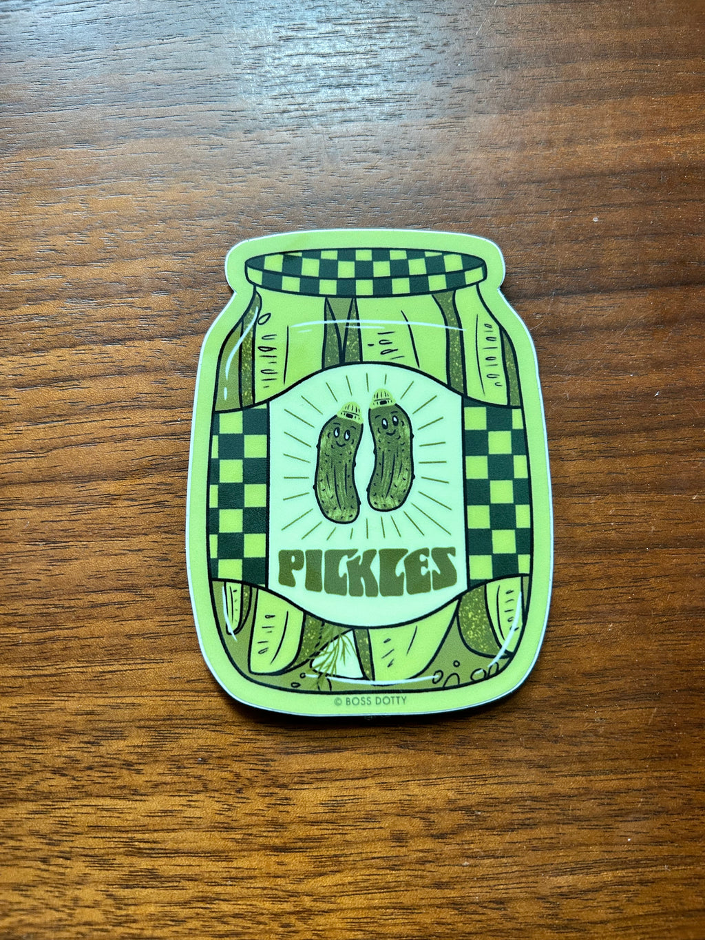 Waterproof vinyl sticker featuring a retro-style jar filled with smiling pickles.