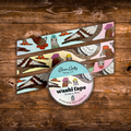 Decorative washi tape featuring whimsical New York City pigeons wearing colorful hats and accessories on pastel backgrounds.