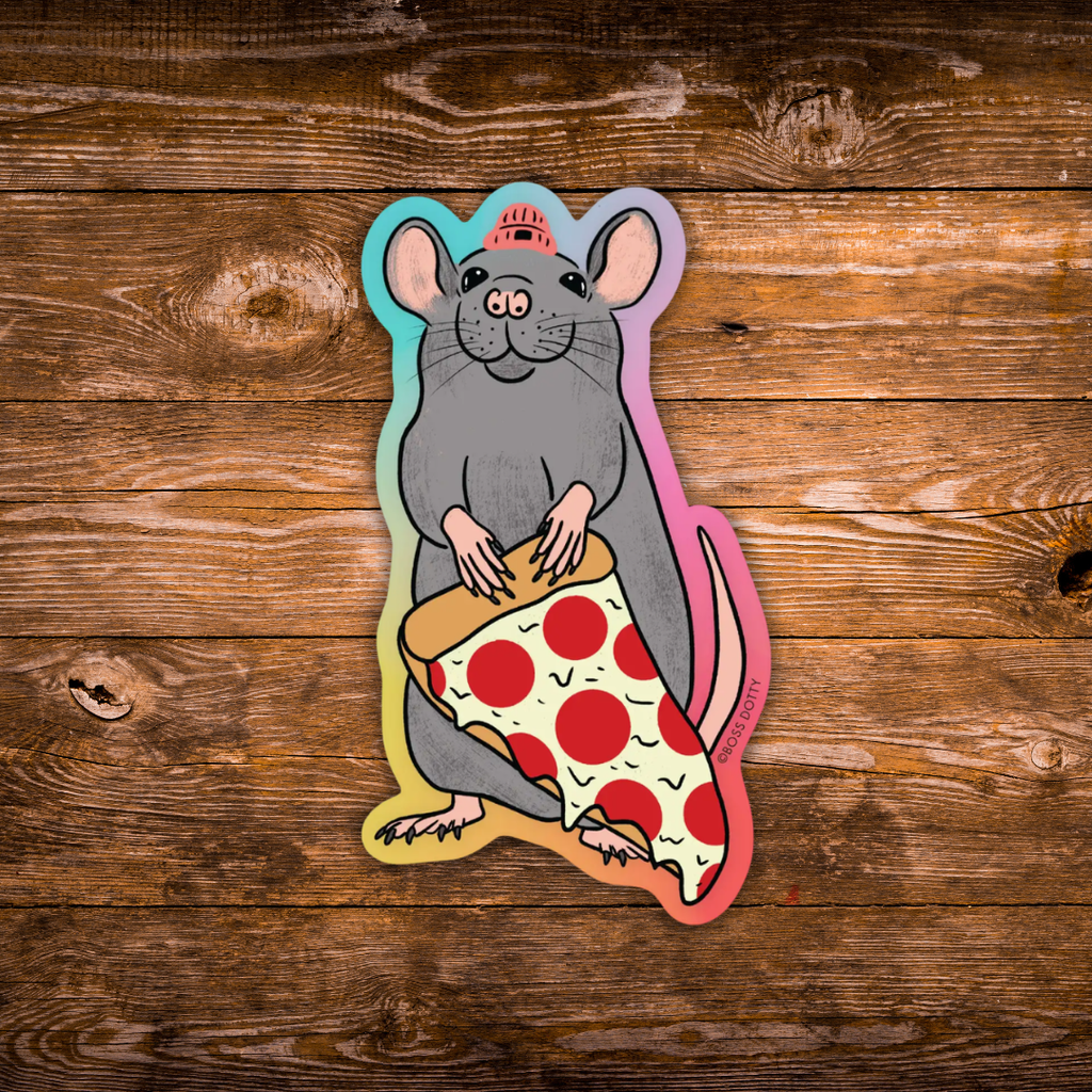 A die-cut sticker featuring a cartoon gray rat wearing a small red hat and holding a slice of pepperoni pizza, shown on a rustic brown wooden background.