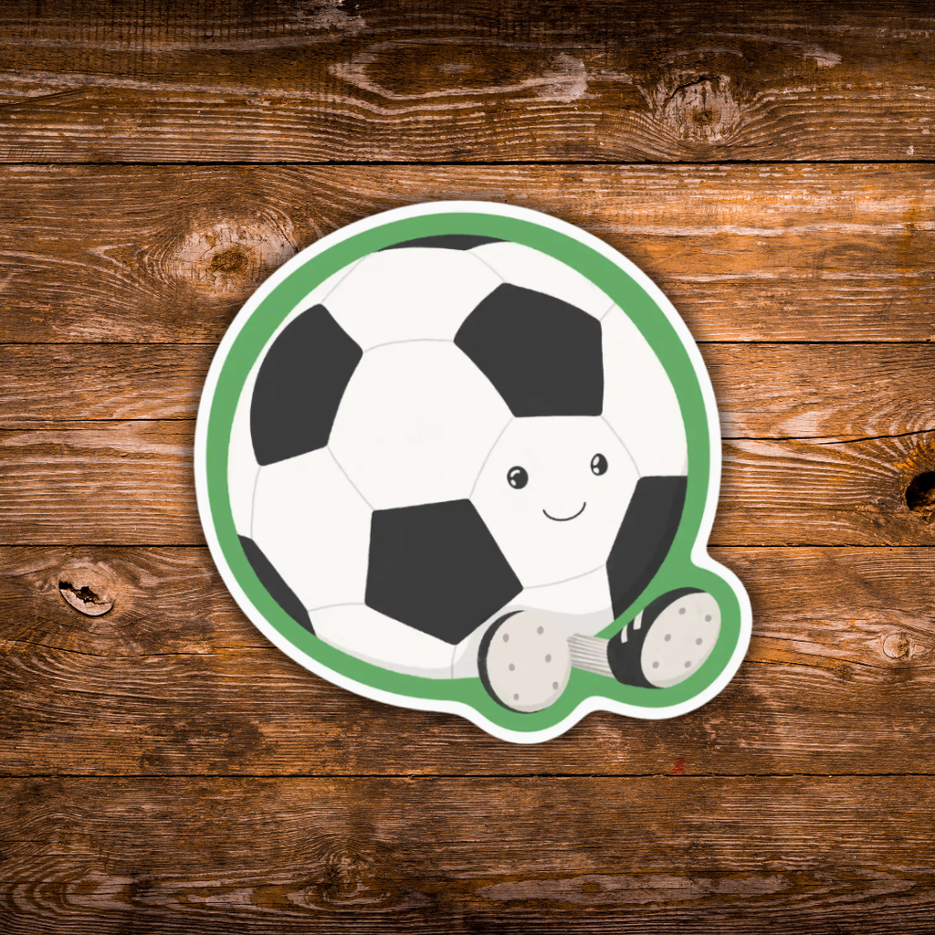 Cute smiling soccer ball sticker with little cleats and a green outline.
